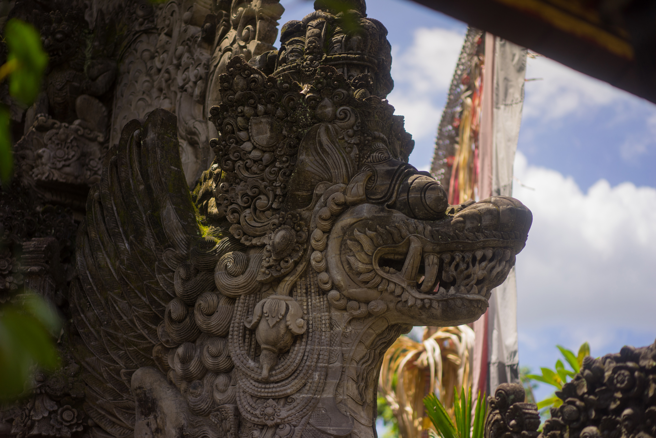 A Naga looks over the temple below it