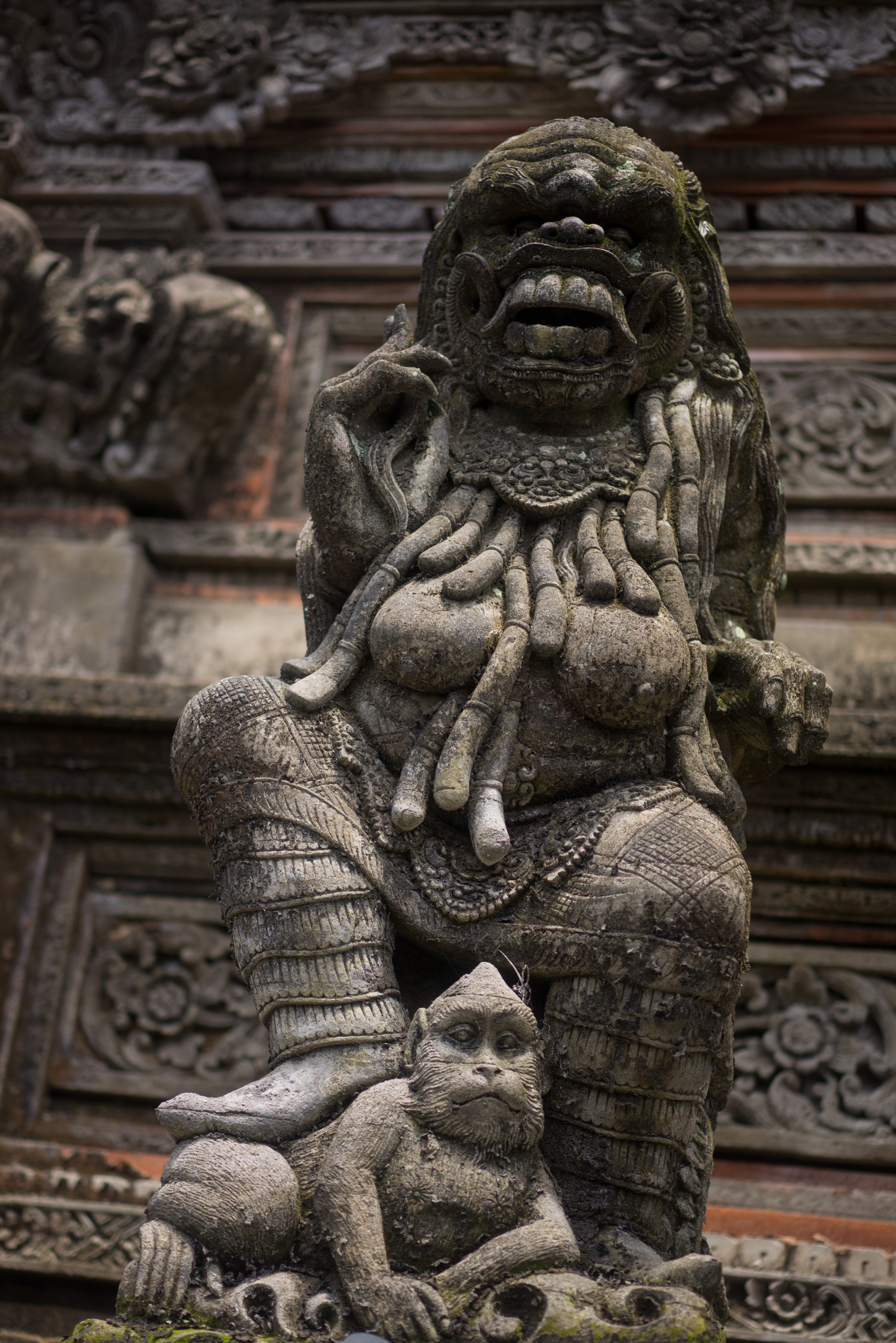 Personal monkey footrest for this Rangda