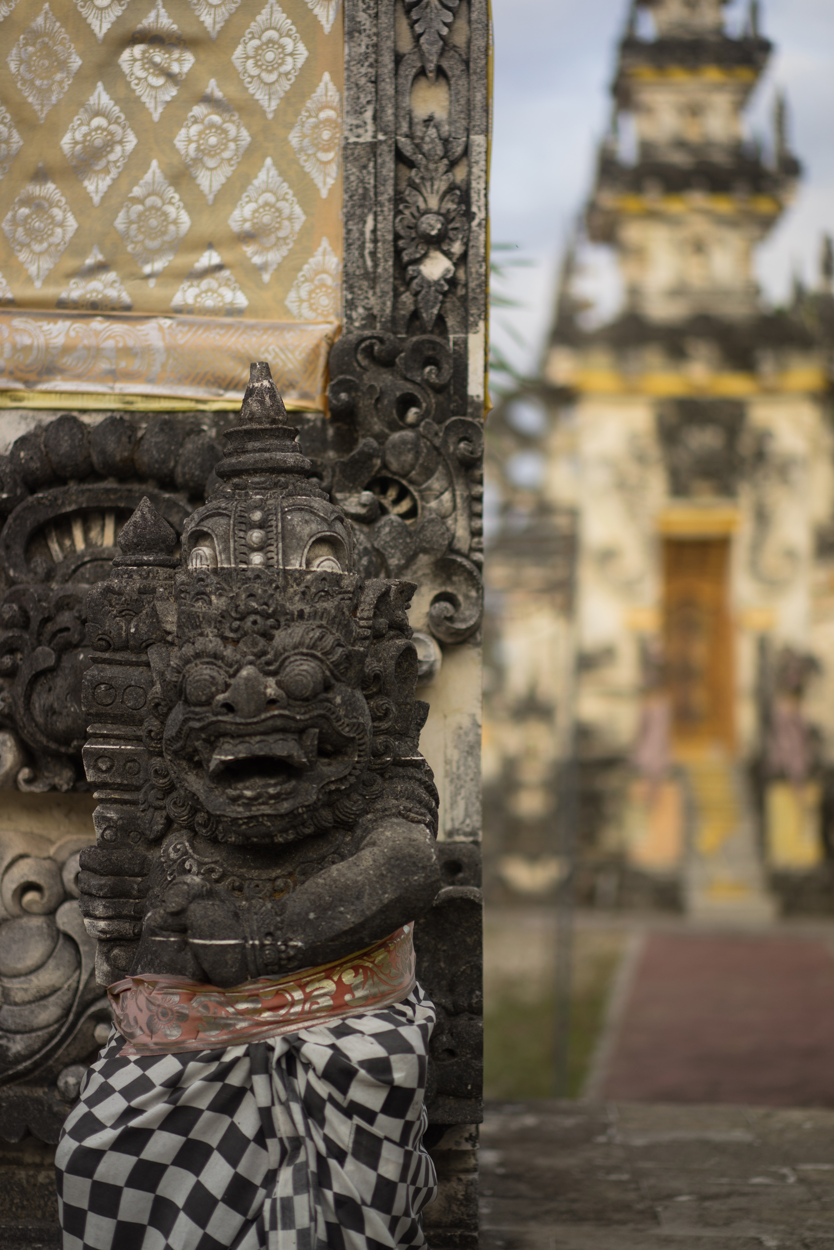 A barong wearing a sarong protecting the Heaven's Gate