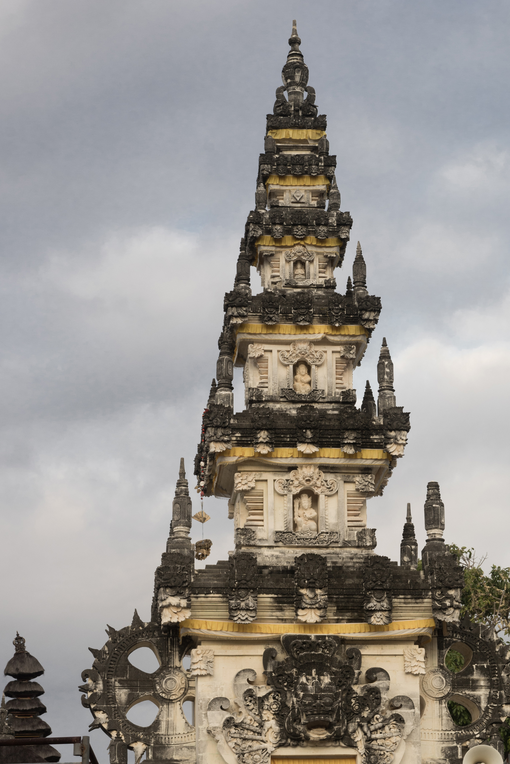 A tower adorned with sacred symbolism