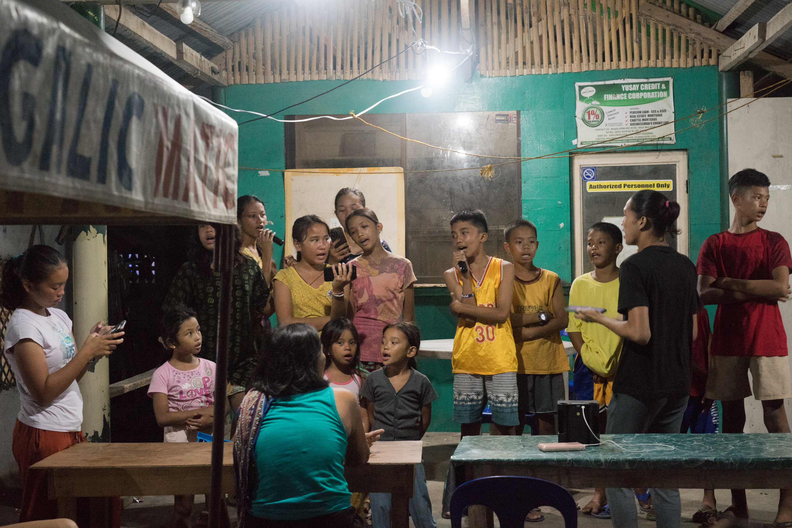 The children of Apo practice for mass the next morning