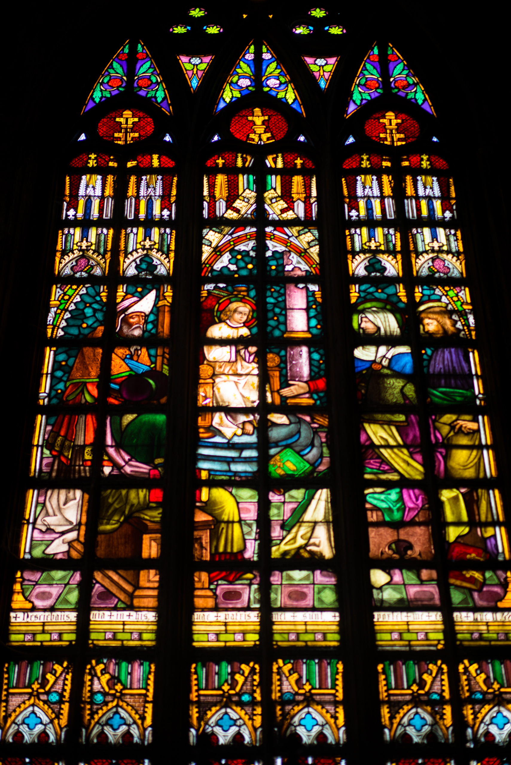 A stained glass window from inside the Steel Cathedral
