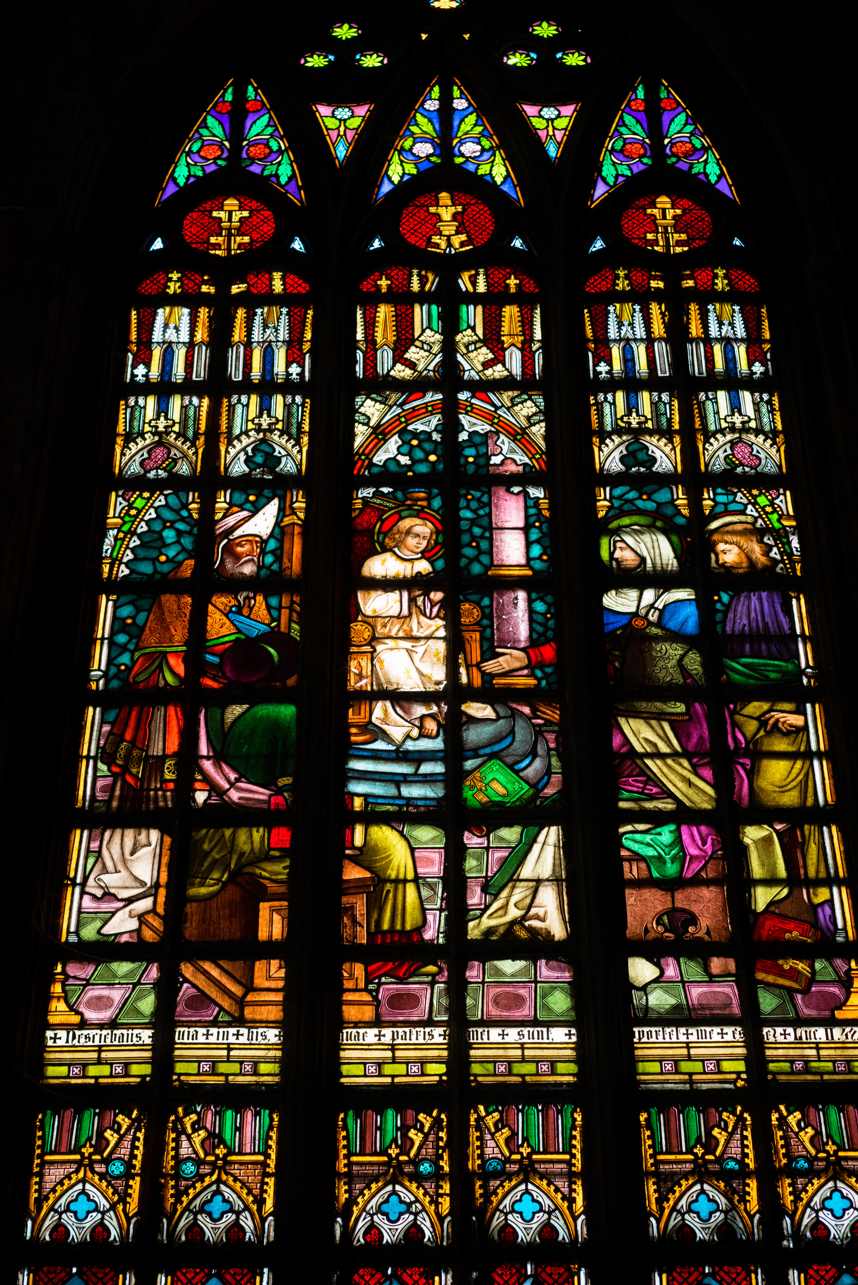 A stained glass window from inside the Steel Cathedral