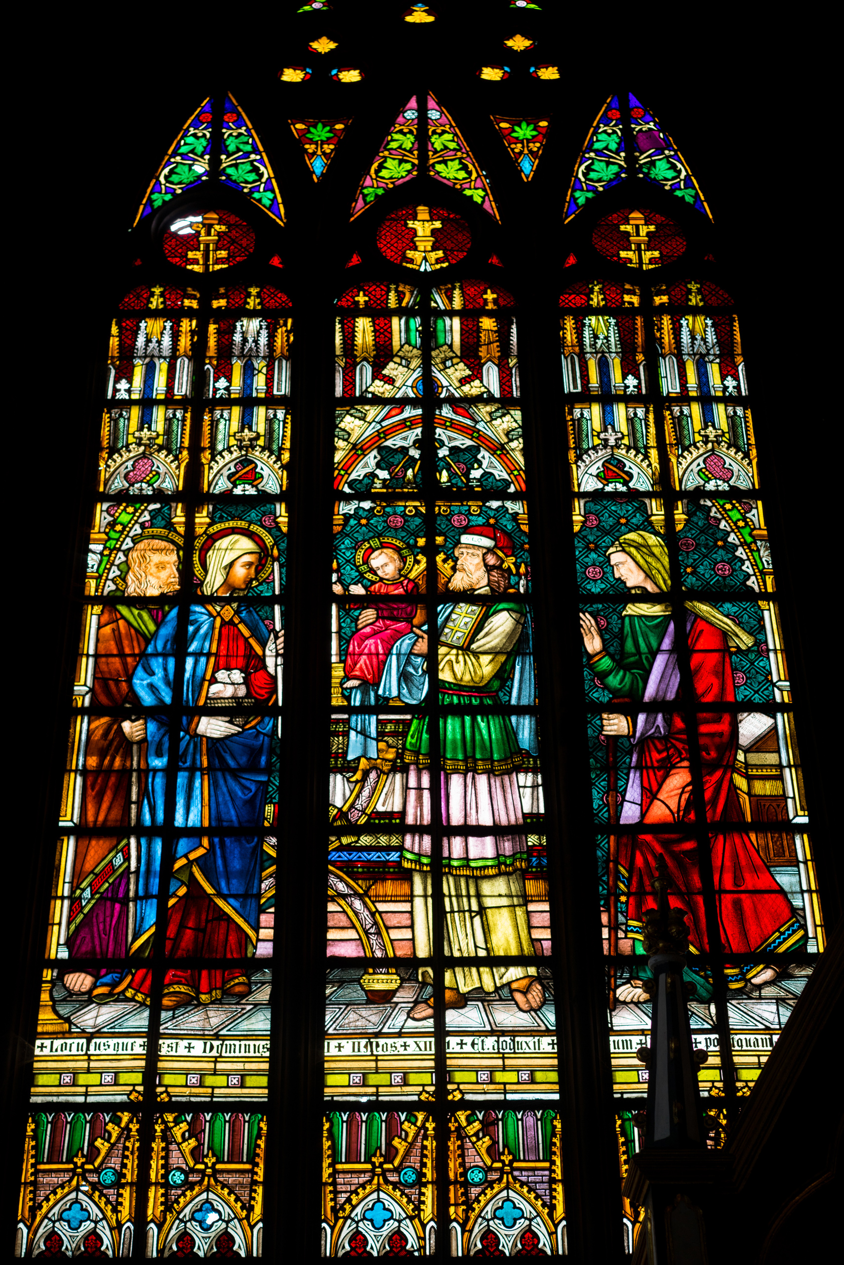 A stained glass window from inside the Steel Cathedral