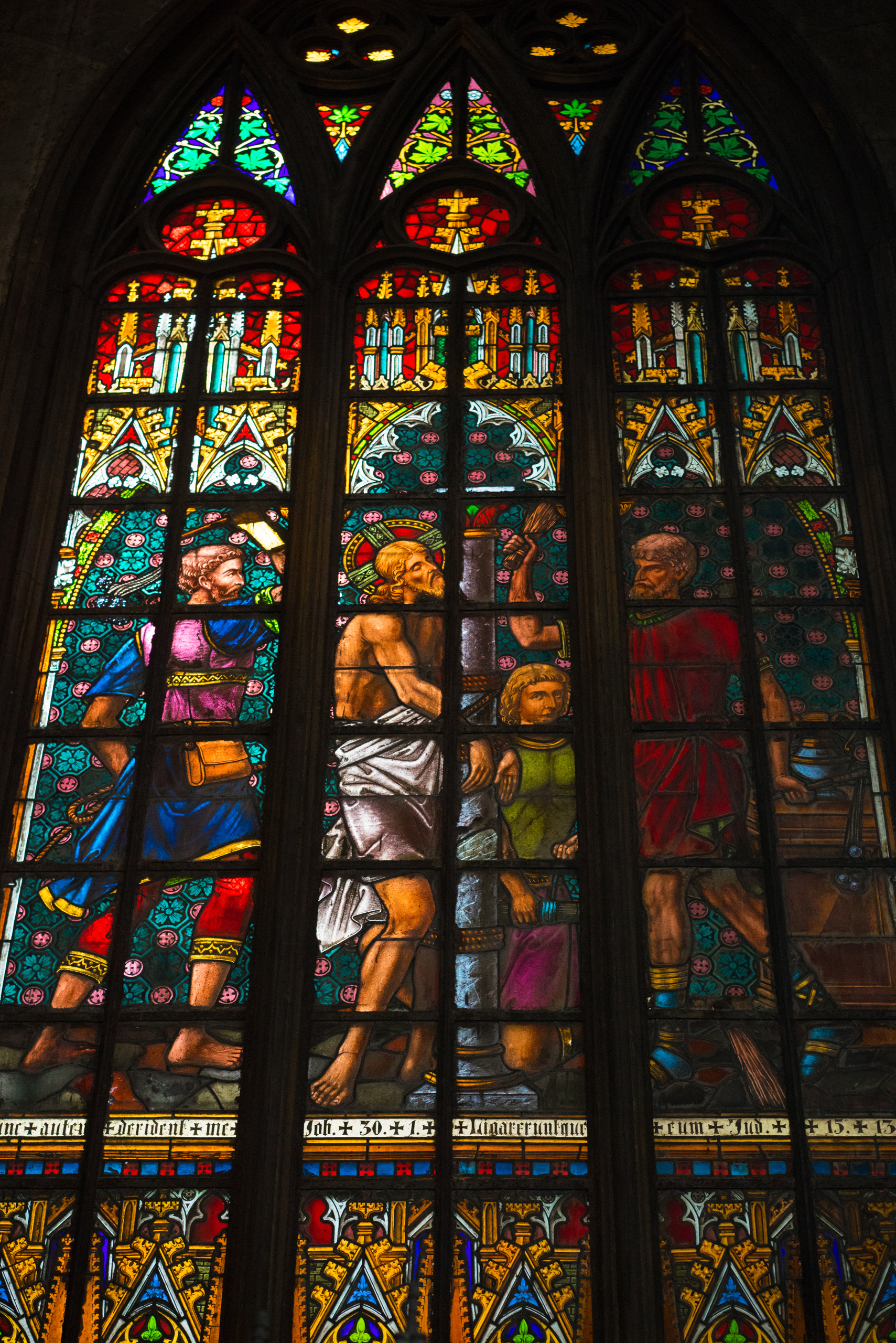 A stained glass window from inside the Steel Cathedral